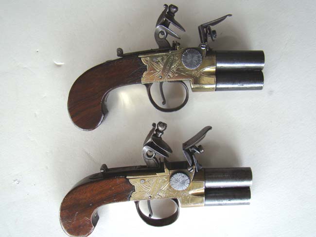 A fine pair of Henry Nock double barrel brass frame flintlock pocket pistols circa 1775-1785 — image 2